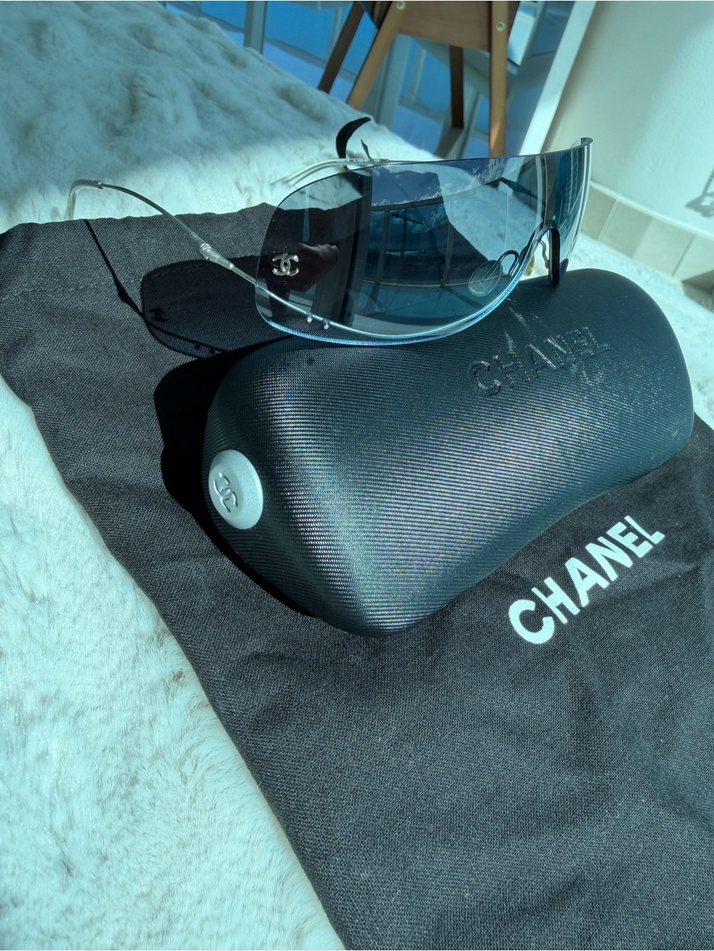 CHANEL Vintage Silver Rimless Sunglasses with blue lenses